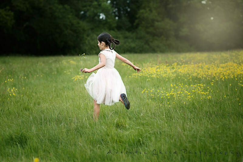 Professional London Children Photographer 4 7 years old girl running in London park