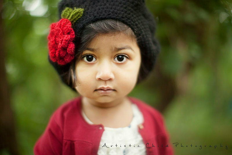 Bromley Toddler Photos | Anika 5 Bromley Toddler Photos | 18 months old girl wearing a cute black hat with red flower