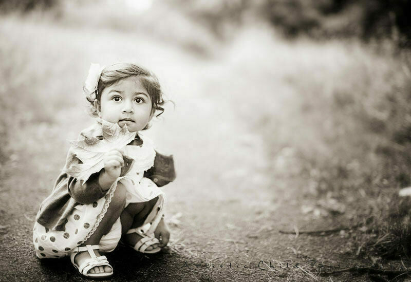 Bromley Toddler Photos | Anika 6 black and white portrait of 18 months old little girl with a leaf | Bromley