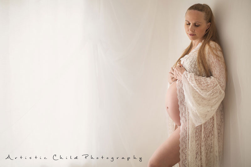 Professional London Maternity Photo Session 10 portrait of 30 weeks pregnant woman in maternity gown | London