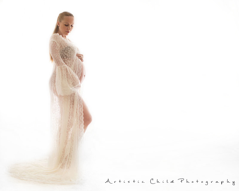 Professional London Maternity Photo Session 3 Professional London Maternity Photo Session | backlit portrait of 30 weeks pregnant women posing in beautiful maternity gown