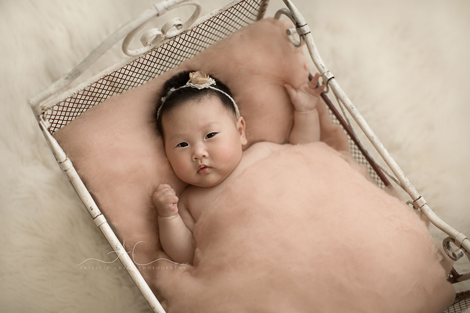 Beautiful London Baby Photos | Yitong 6 3 months old baby girl photographed in little metal bed prop | London
