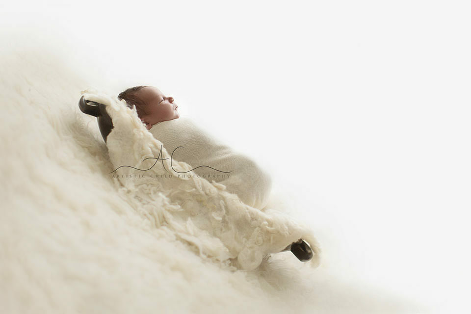 Bromley Newborn Photography | Bulcsu 3 newborn baby boy sleeping in wooden trench bowl | London