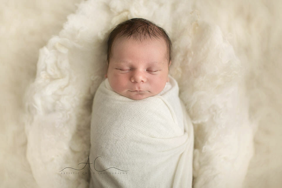 Bromley Newborn Photography | Bulcsu 4 portrait of a swaddled newborn baby boy | London