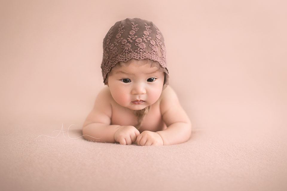 Professional Bromley Baby Images | Eleanor 5 100 days old baby girl in a cute purple hat | London