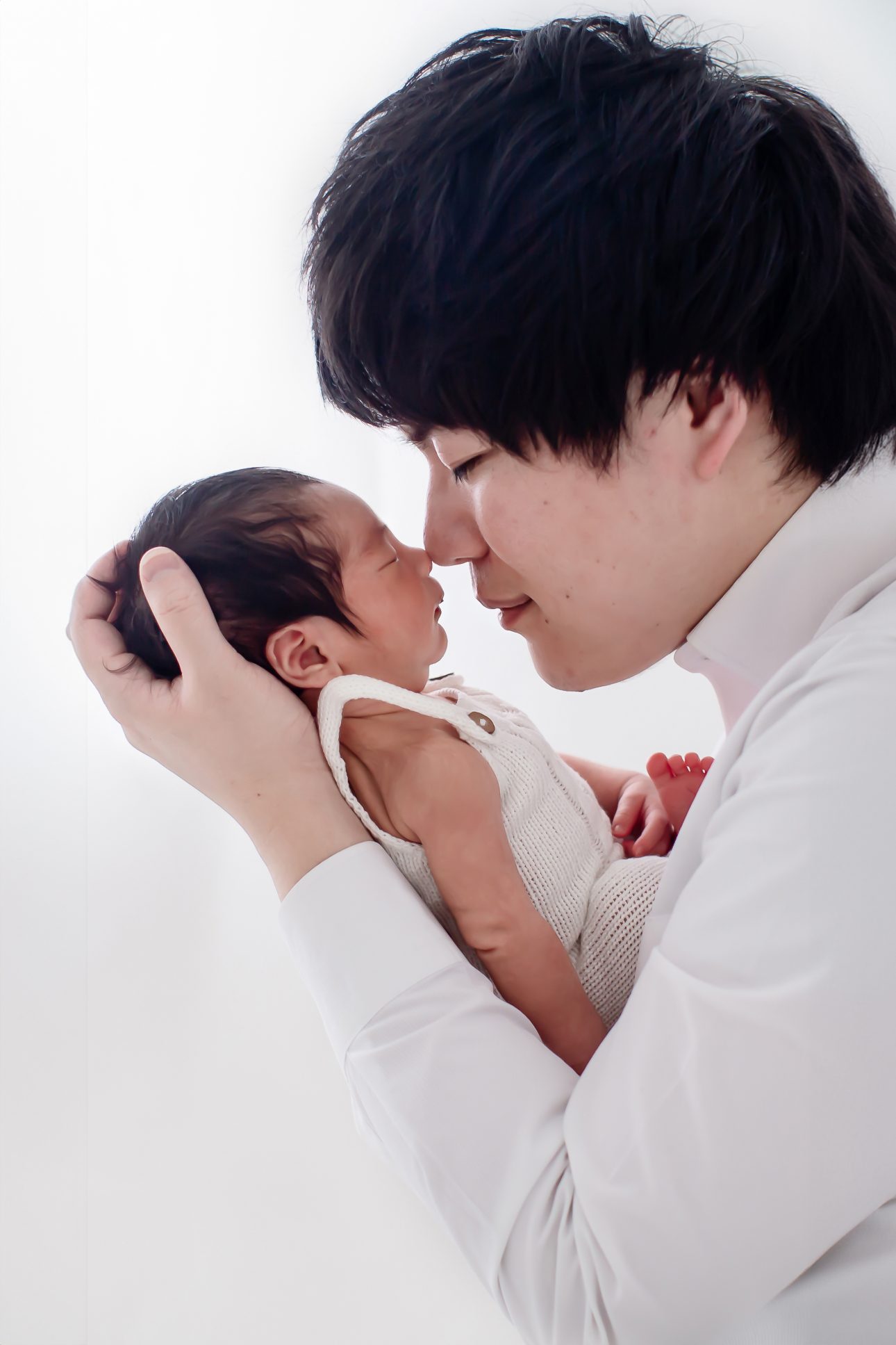 Bromley Newborn Photoshoot | an intimate moment between dad and his newborn son