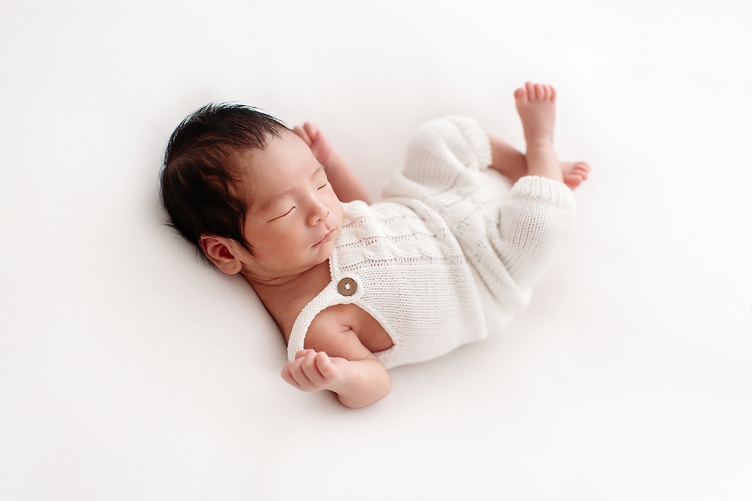 Bromley Newborn Photoshoot | portrait of a newborn boy wearing a cute knitted outfit