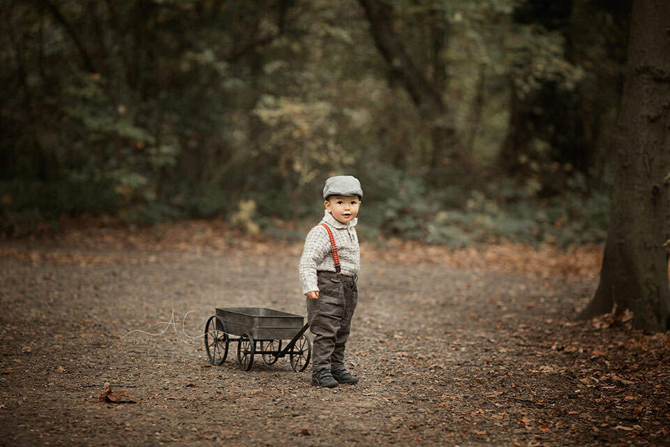 Professional London Toddler Photo Session | Jacob 6 full body portrait of 18 months old boy taken in the park during autumn season | London