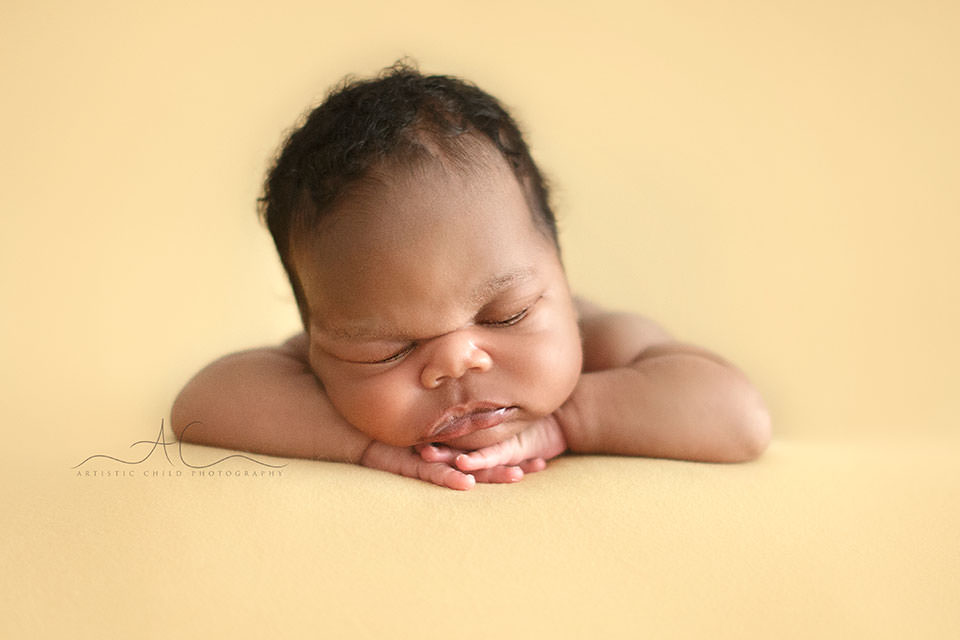 Natural Light London Newborn Portraits | Dreyson 2 newborn baby boy in hands under chin position | London