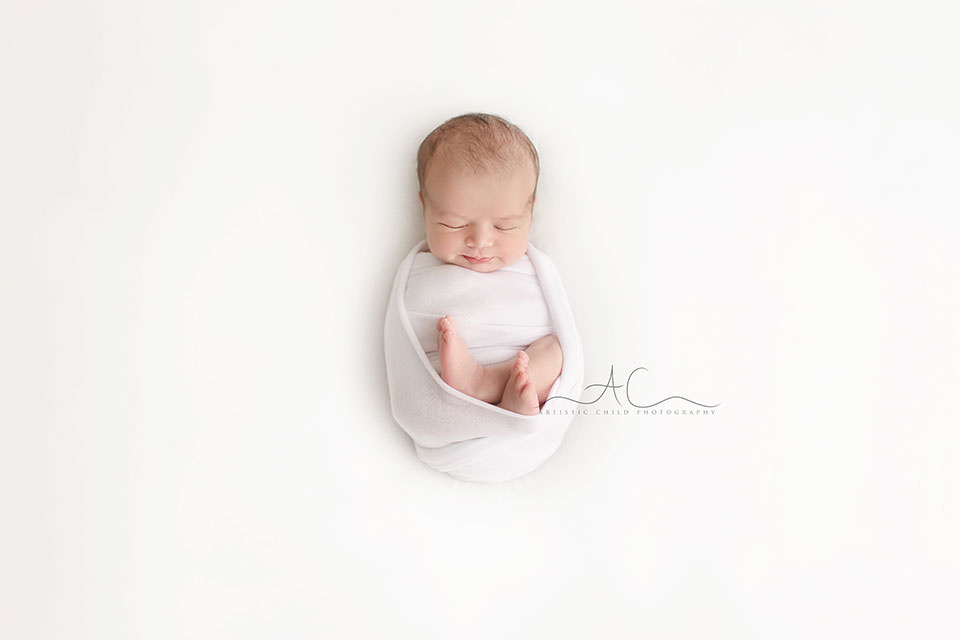 Bromley Newborn Baby Portraits | Ethan 5 Bromley Newborn Baby Portraits | a simple portrait of a newborb baby boy swaddled in white fabric