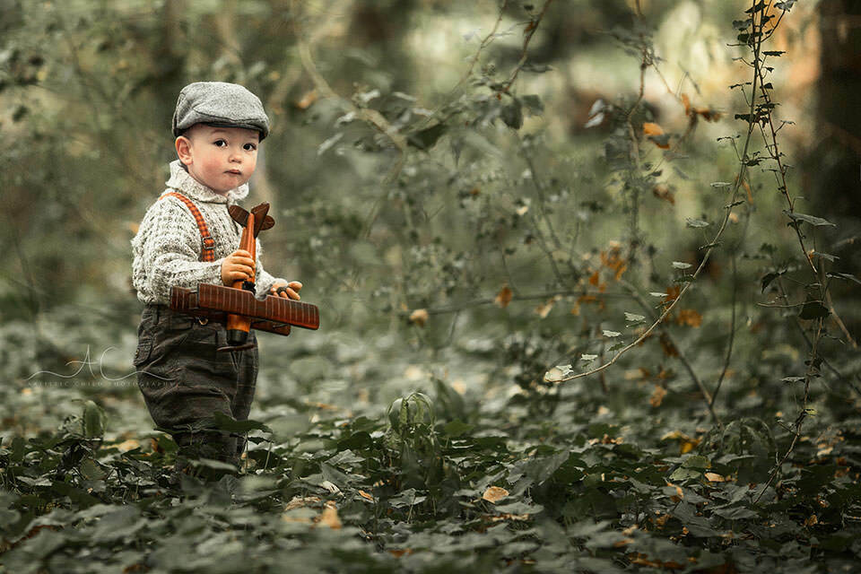 Professional Bromley Toddler Photos | Jacob 5 Professional Bromley Toddler Photos | portrait of 18 months old boy wearing a flat cap and playing in Beckenham Place Park