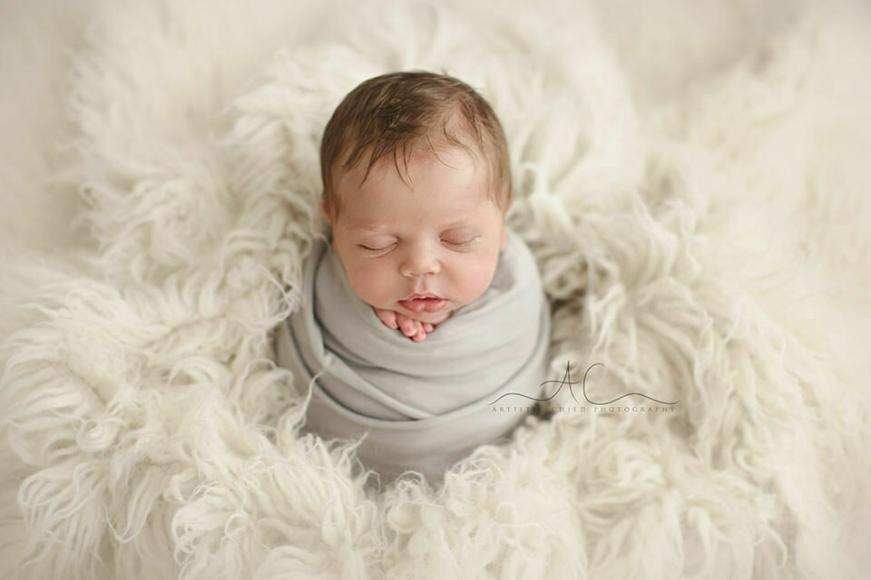 South East London Newborn Baby Boy Images | Finn 5 portrait of a newborn baby boy taken on white flokati | London