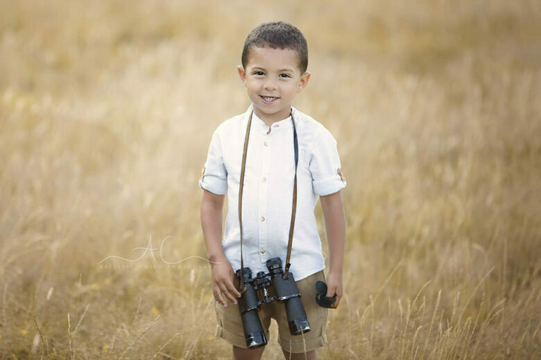 London Children Photography Services | portrait of a 5 year old boy with binoculars