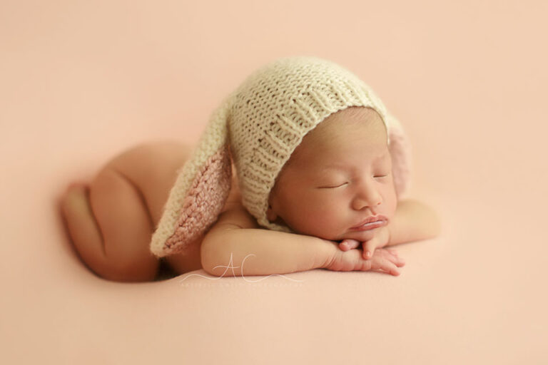 Unique London Newborn Images | Evelyn 11 Unique London Newborn Images | newborn baby girl wears a bunny ear hat