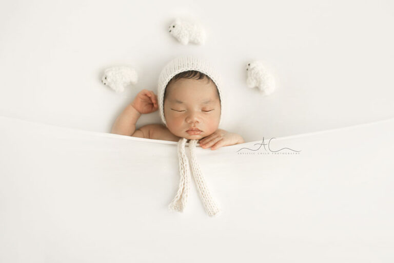 Natural Light London Newborn Photography | newborn baby boy sleeps counting sheep
