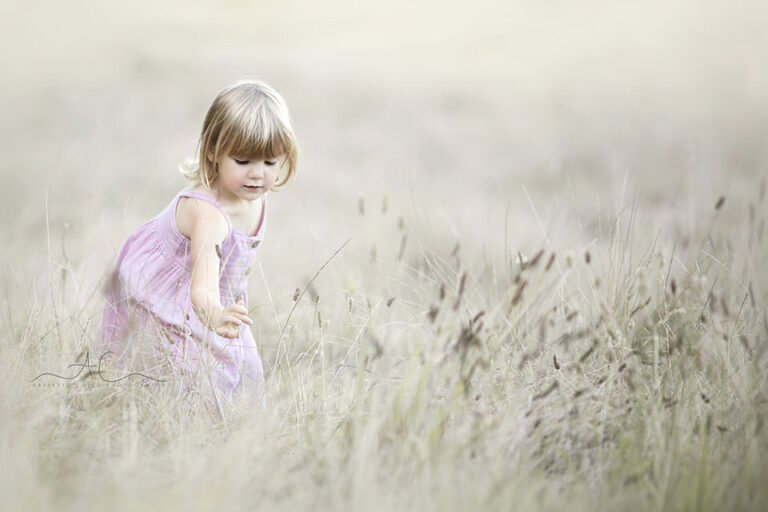 London Kids Pictures | Beatrice 2 London Kids Pictures | 3 year old girl picking flowers in the field of grass