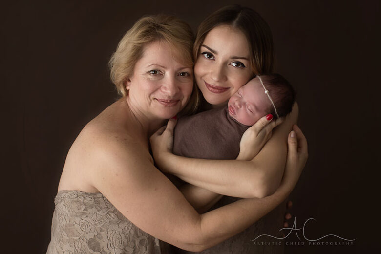 Professional South East London Family Photography Services | generation portrait of a newborn baby girl, her mum and grandmother