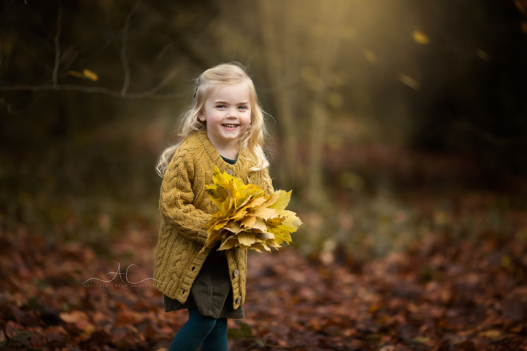 Autumn Mini Photography Sessions London 2020 6 Autumn Mini Photography Sessions London 2020 | portrait of a smiley girl with the bunch of autumn leaves