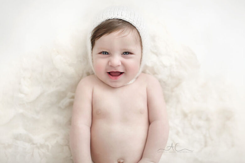 Bromley Baby Photos | portrait of a 7 months old baby boy smiling