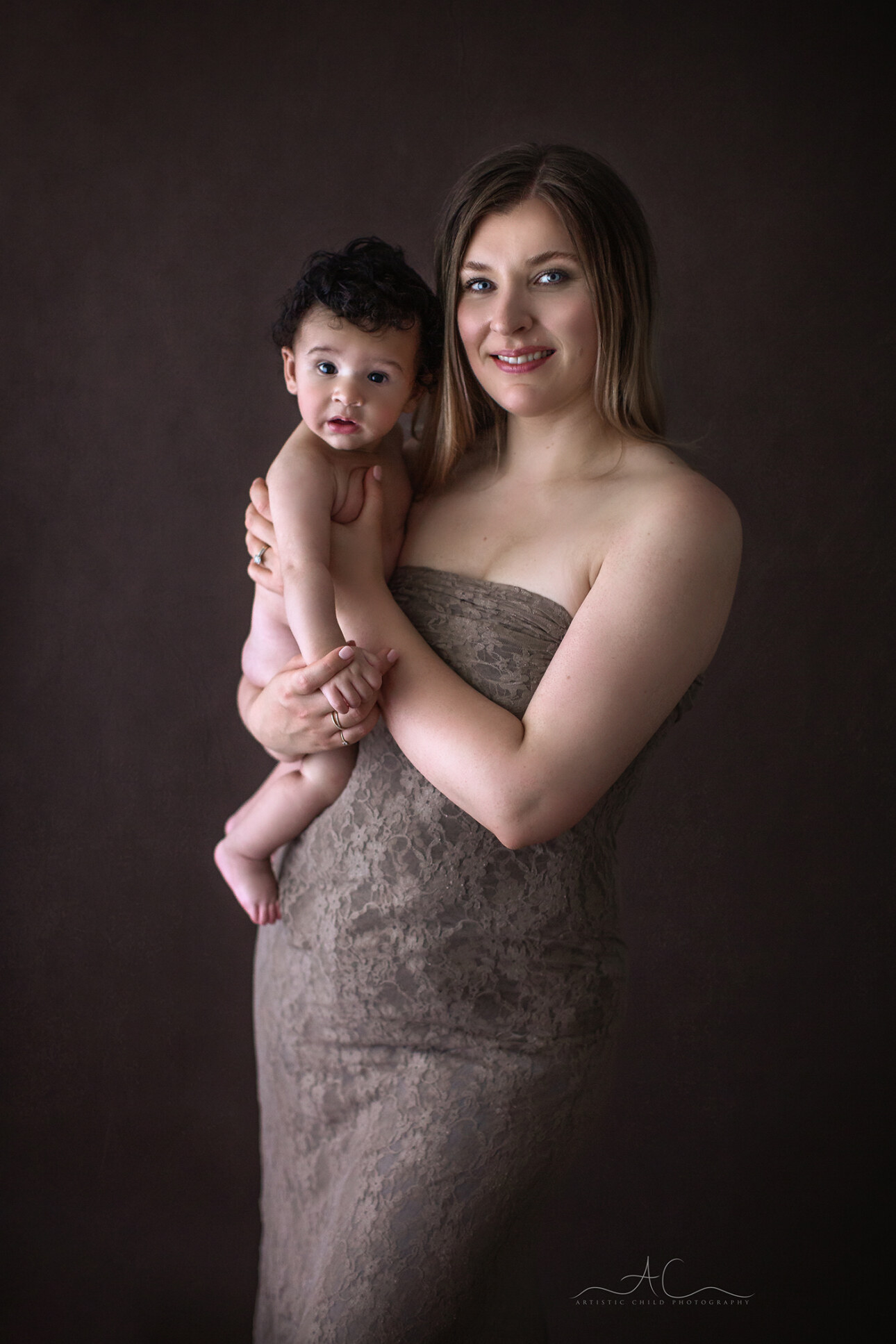 Top South East London Family Portraits | Vincent 2 classic portrait of monther holding her 5 months old baby boy | South East London