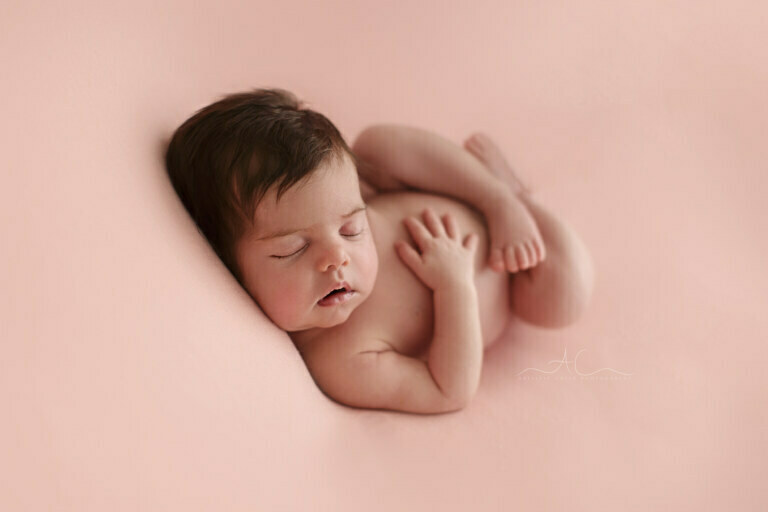 Pretty London Newborn Images | backlit portrait of a newborn baby girl sleeping