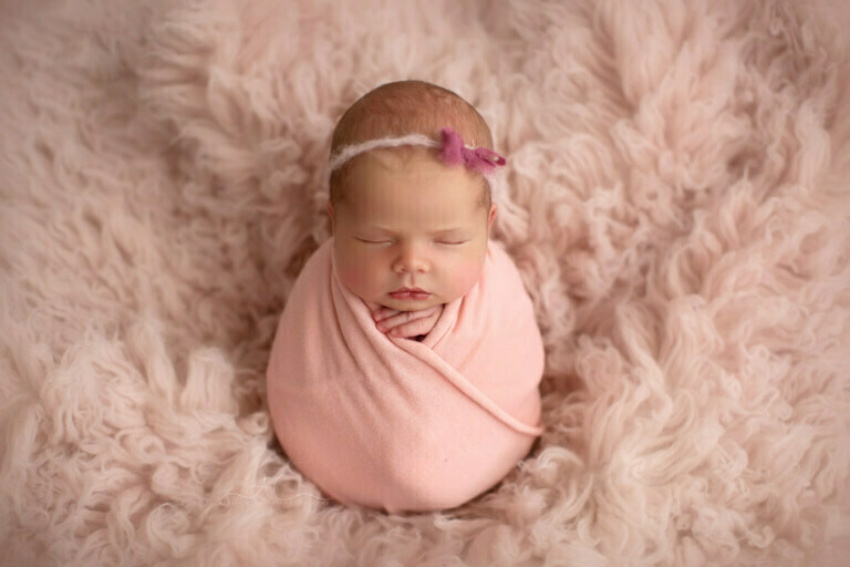 6 Beautiful Bromley Newborn Baby Images | Alice 6 Beautiful Bromley Newborn Baby Images | photo of a newborn baby girl wearing a cute pink headtie