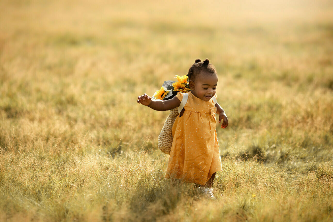 Beautiful London Toddler Photography | Dassah 6 Beautiful London Toddler Photography | portrait of a 1 year old girl running happily through the meadow