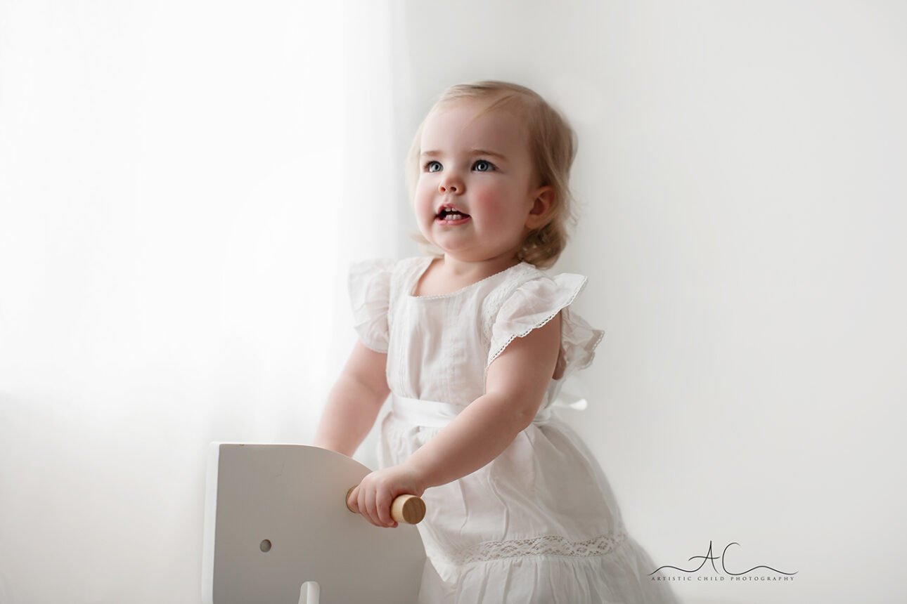 Amazing South East London Toddler Images | a close up portrait of a little toddler girl taken on white setting