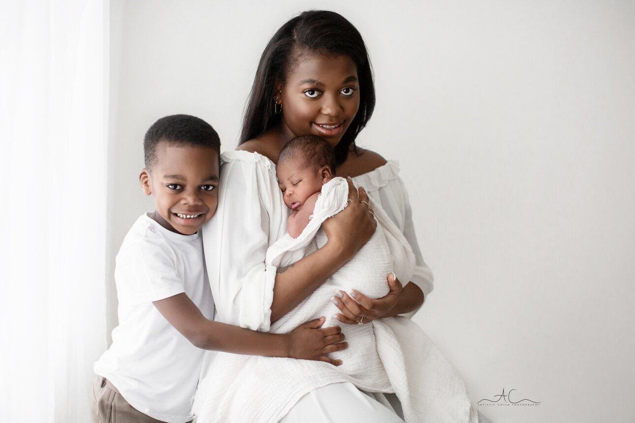 Amazing South East London Newborn Photography | portrait of mum and her newborn baby boy and his older brother