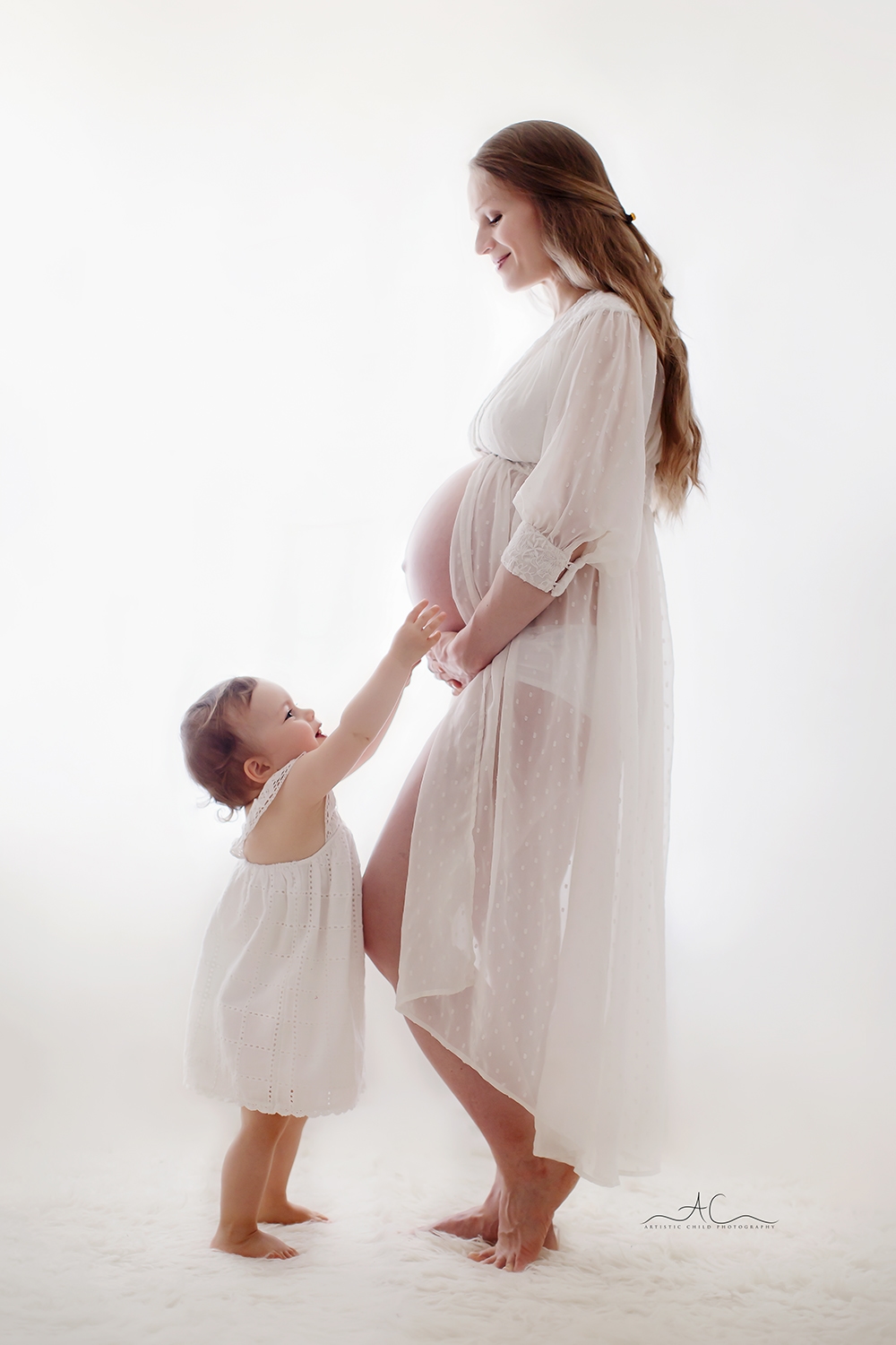 Beautiful London Mother's Day Mini Sessions | 2025 12 London Mother's Day Mini Sessions | pregnant Mum and her first born daughter portrait