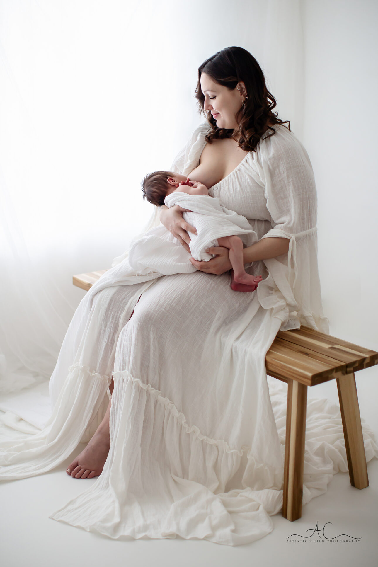 Beautiful London Mother's Day Mini Sessions | 2025 10 London Mother's Day Mini Session | Mum brestfeeding portrait