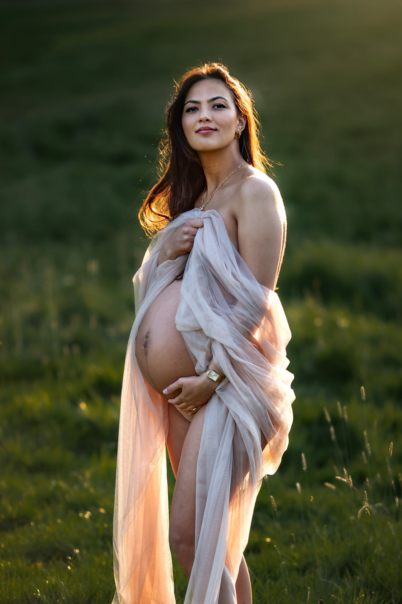 London Maternity Photoshoot | outdoor maternity portrait with a drape fabric