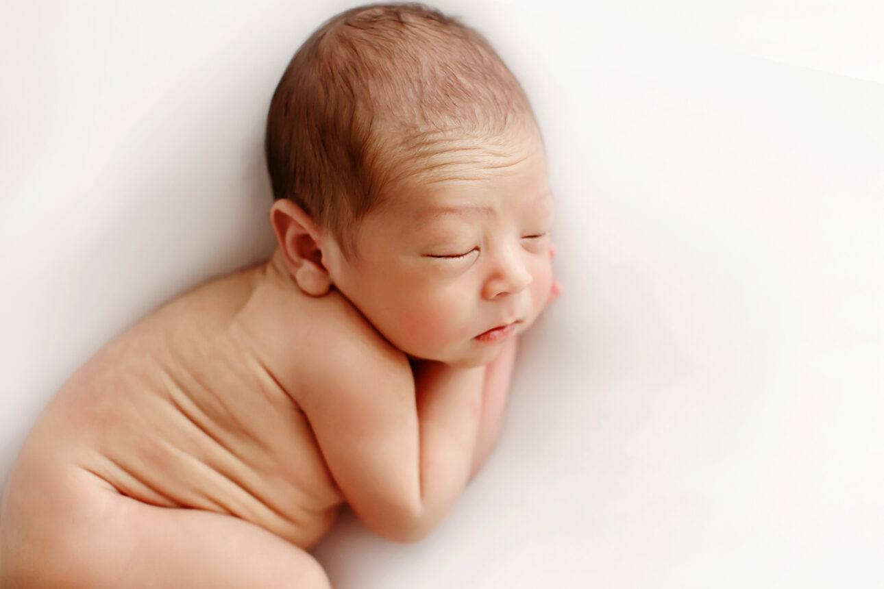 London Newborn Baby Portrait | newborn baby boy sleeping during his photo session