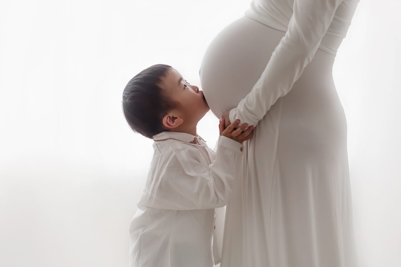 Bromley Maternity Photographer 24 Bromley Maternity Session | a first born son kissing mum's bump